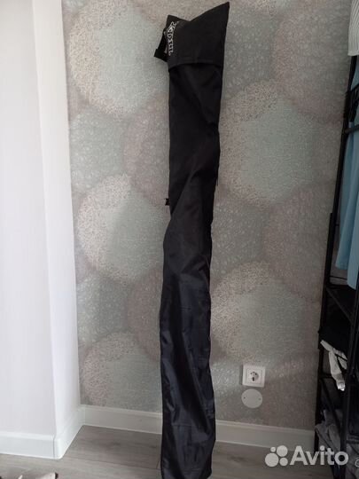 Беговые лыжис палками в защитном чехле