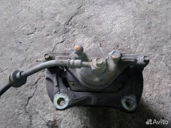 Суппорт тормозной передний левый на Opel Astra J