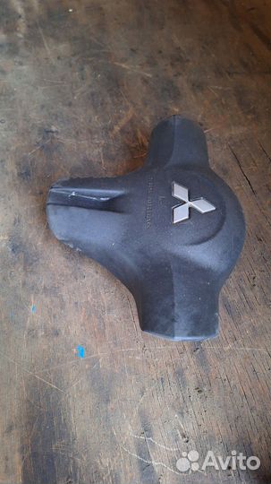 Митцубиси ланцер 9 подушка руля