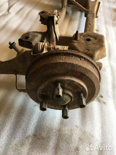 Рычаг задний продольный левый со ступицей