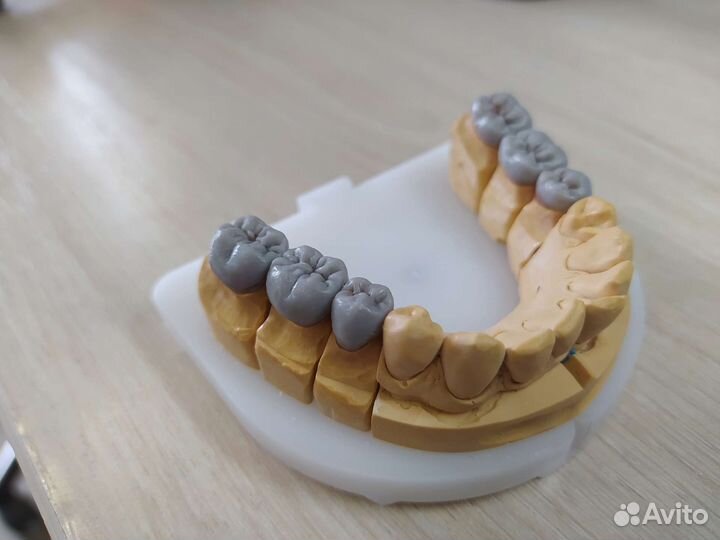 Зубной техник