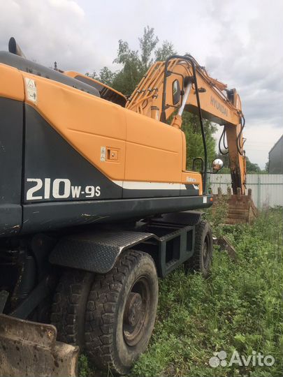 Колёсный экскаватор Hyundai R210W-9S, 2011