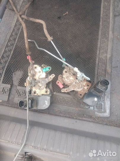 Замок двери передний Chrysler Voyager 3