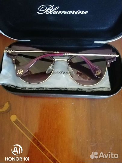 Солнечные очки женские