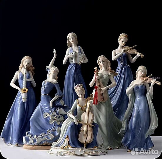 Фарфоровая статуэтка дама с виолончелью