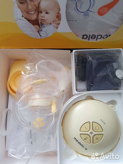 Молокоотсос medela электрический