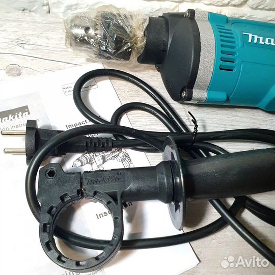 Ударная дрель Makita