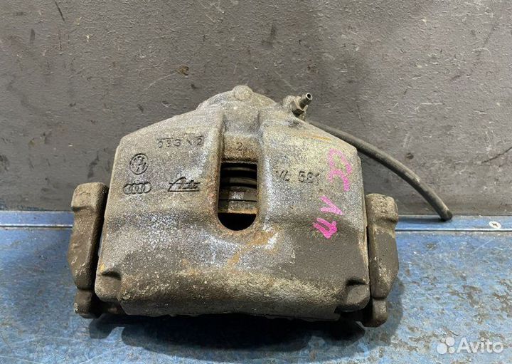 Суппорт передний левый Volkswagen Passat B6