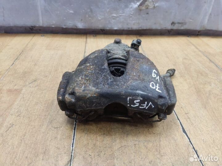 Тормозной суппорт передний левый Opel Astra H