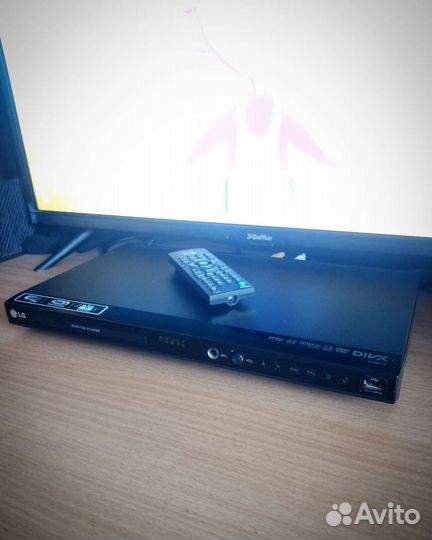 DVD проигрыватель с караоке dvd-плеер LG dvx647k