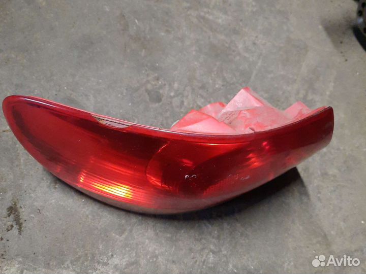 Задний левый фонарь mazda millenia