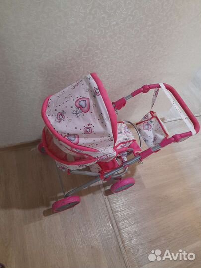 Детская игрушечная коляска