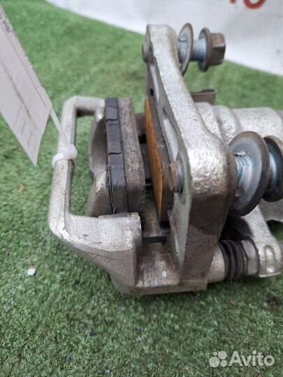 Суппорт тормозной задний левый Honda Accord CU2