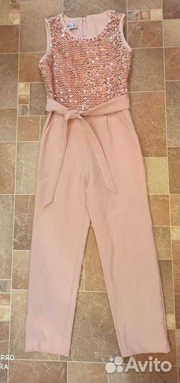 Нарядный комбинезон для девочки 128