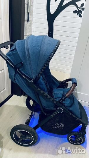 Всесезонная прогулочная коляска Италия