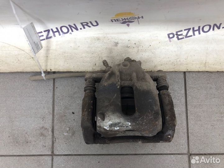 Суппорт тормозной передний правый Nissan Note