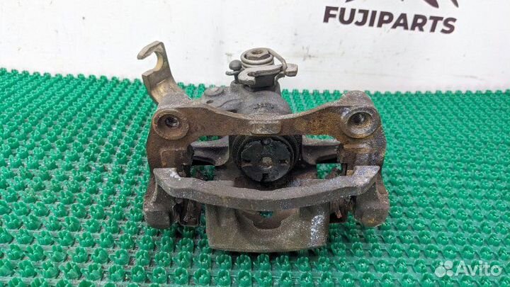 Суппорт тормозной задний правый Nissan Avenir RW11