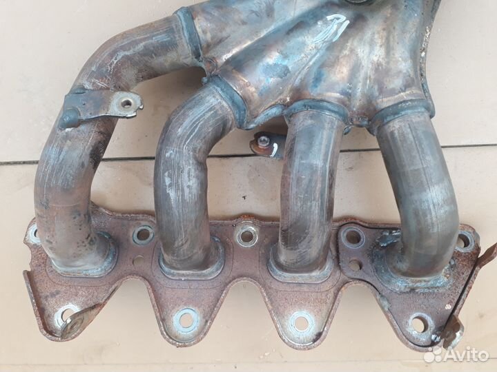 Коллектор выпускной Nissan Almera G15