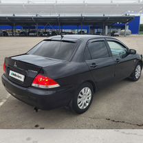 Mitsubishi Lancer 1.6 MT, 2009, 186 000 км, с пробегом, цена 575 000 руб.