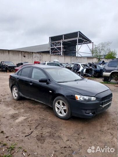 Накладка зеркала внутри левая Mitsubishi Lancer CY